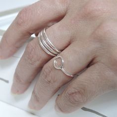 Delicate design adjustable ring, made in minimalist style Real 925 silver with circle detail, ideal gift for girl, teenager or woman. Material: 100% 925 Sterling Silver. Weight: 0.58 grams. Measure: 1.7 cm adjustable diameter. Band width: 0.8 mm. Tips for the care of your Silver Jewelry: * Keep your silver jewelry in a cool and dry place to avoid oxidation. * Avoid exposing them to water, perfume, and harsh chemicals. * Clean your Silver jewelry relatively frequently to maintain its shine and be Open Circle Ring, Delicate Silver Rings, Simple Rings, Water Perfume, Geometric Ring, Silver Circle, Circle Ring, Delicate Design, Rings Simple