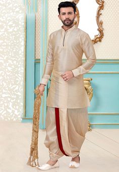 Art Silk Kurta in Beige This Readymade attire is Crafted in Chinese Collar Neck and Full Sleeve Available with an Art Silk Dhoti Pant in Beige Do note: Dupatta and Footwear shown in the image is for presentation purposes only. Half to one inch may vary in measurement. (Slight variation in actual color vs. image is possible) Dhoti Pants For Men, Kurta With Dhoti, Mens Traditional Wear, Indian Wedding Clothes For Men, Wedding Kurta For Men, Vs Image, Gents Kurta, Silk Stoles, Men's Ethnic Wear