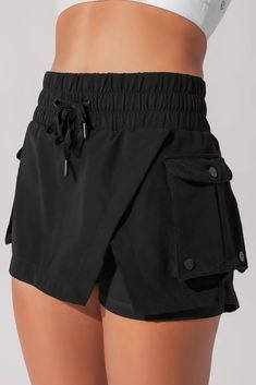 The skort just reached a new level (literally). Meet the Hiking Superskort™ - designed so you can climb and stride peek-a-boo-free.Our fav feature? The 4 pockets to hold your essentials [read: snacks] Sporty Black Skort With Pockets, Black Nylon Skort For Sports, Black Sports Skort With Pockets, Functional Sports Skort With Side Pockets, Black Nylon Athletic Shorts With Functional Pockets, Black Nylon Athletic Shorts With Pockets, Casual Black Moisture-wicking Skort, Sporty Workout Skort With Pockets, Functional Black Athletic Shorts With Pockets