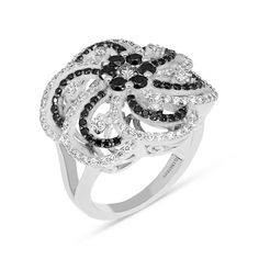 Elegant and sophisticated, this diamond twist flower shaped ring is a treat for the eyes. Created in 18K white gold, the mesmerizing ring features black and white diamond ribbons swirling into a flower shape. Surprise your loved one with this feminine statement ring. Available in all sizes, send us yours! 1.21 carat white diamonds 0.88 carat black diamonds 18K white gold The ring design can be customized to suit your particular taste & budget with any Size, Color & Clarity Combination of Black Diamond Pendant, Diamond Ribbon, Orange Sapphire, Black Diamonds, Diamond Flower, Tennis Bracelet Diamond, Diamond Drops, Salt And Pepper Diamond, Diamond Drop Earrings