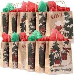 small christmas gift bags with snowmen and trees printed on the front, set against a white background