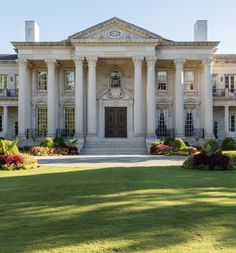 a large white building with columns and pillars