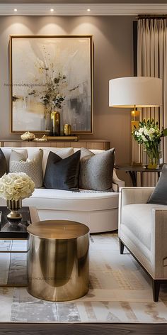 a living room filled with lots of furniture and flowers on top of a coffee table