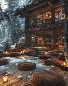 a wooden cabin in the woods with lit candles on the floor and round bean bags