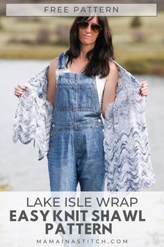 a woman wearing overalls and an open jacket with text overlay that reads free pattern lake isle wrap easy knit shawl pattern