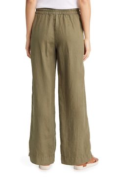 Crafted from lightweight linen, these tie-waist pants feature breezy wide legs for vacation-ready vibes. 30 1/2" inseam; 22" leg opening; 11 1/2" front rise; 17" back rise (size Medium) Elastic/drawstring waist Side-seam pockets 100% linen Machine wash, line dry Imported Relaxed Fit Wide Leg Pants For Vacation, Green Linen Beach Pants, Solid Linen Pants For Vacation, Green Linen Bottoms For Vacation, Green Relaxed Fit Wide Leg Vacation Pants, Green Relaxed Fit Wide Leg Pants For Vacation, Wide Leg Linen Pants With Tie Waist, Green Wide Leg Pants Relaxed Fit For Vacation, Green Linen Beach Bottoms