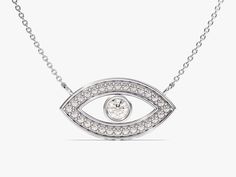 Embrace protection and modern elegance with this 14k solid gold necklace. A single, ethically sourced diamond twinkles at the center of the evil eye symbol, offering a touch of sparkle and warding off negativity. Choose from classic yellow, white, or rose gold for a personalized touch. The bezel setting adds a contemporary twist, making this a perfect everyday talisman. FEATURES• Made to Order• Gold Kt: 14k Solid Gold, 18k Solid Gold• Gold Color: Rose Gold, Yellow Gold, White Gold• Available Len Modern White Gold Jewelry With Diamond Eyes, White Gold Diamond Necklace With Diamond Eyes For Anniversary, Anniversary White Gold Necklaces With Diamond Eyes, Luxury Diamond Eyes Necklace As Gift, Anniversary White Gold Necklace With Diamond Eyes, Luxury Diamond Eyes Necklace For Gift, Luxury Necklaces With Diamond Eyes For Anniversary, Luxury Diamond Eyes Necklaces For Anniversary, Elegant White Gold Evil Eye Necklace