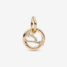 Let the stars guide your look with the Taurus Zodiac Dangle Charm. The dangle is crafted our 14k gold-plated unique metal blend, has a circular outer frame and features clear sparkling cubic zirconia as well as the shape of the Taurus zodiac sign. The back side of the frame is engraved with "Taurus".Loyal, trustworthy and strong-minded, the Taurus in your life can always be counted on to be good-natured, down-to-earth and tenacious. Wear this Pandora Moments Dangle Charm as a sign of your own sign's strength or give it as a gift of appreciation to the Taurus in your life. - Pandora Taurus Zodiac Dangle Charm - 14k Gold-plated unique metal blend / Cubic Zirconia / Clear Mesh Bracelet, Taurus Zodiac, Dangle Charms, Snake Chain, Bracelets And Charms, Pandora Charms, Chain Bracelet, Cubic Zirconia, Leather Bracelet