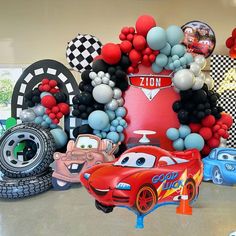 cars birthday party decorations including balloons and streamers