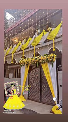 a yellow and white stage set up for a wedding