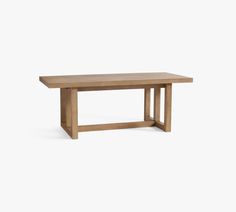 a wooden table on a white background with no one around it or the table top