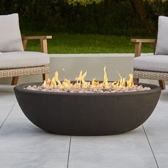 a fire pit sitting on top of a patio