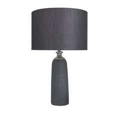 a gray table lamp with a black shade on the base and a grey fabric lampshade