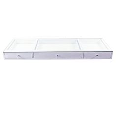 a white table with three drawers on it