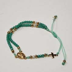 Adjustable String Bracelet, Beautiful Dainty Rosary Bracelet. Mint/ Jade Green. Our Lady Of Guadalupe, Great Gift For First Communion, Confirmations, Or Any Occasion. New Plastic Beads. Molding(Hollow) Rosary Ideas, Rosary Design, Adjustable String Bracelet, Rosary Jewelry, Christian Bracelets, Bracelets Ideas, Ankle Jewelry, Aesthetic Jewelry, Catholic Jewelry