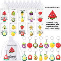 various key chains with fruits and vegetables on them, including apples, watermelon, kiwis