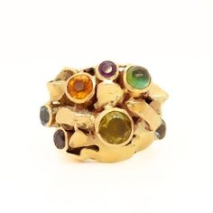 Vintage 1960's Modernist 14k Gold & Multi-Gemstone Cocktail Ring by Resia Schor Size 8.75 | Chairish Emerald Cabochon, Modernist Ring, Ancient Jewelry, Aqua Marine, Green Tourmaline, Hand Built, Cocktail Ring, Cocktail Rings, Bezel Setting