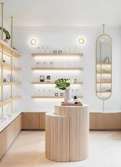 the inside of a store with wooden shelves