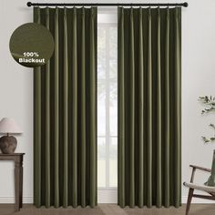 the curtain is open and ready to be hung in front of a window with green curtains