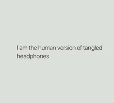 i am the human version of tangled headphones text on grey background with black and white image