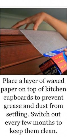 a hand is reaching for paper on top of a kitchen cupboard with the words, place a layer of waxed paper on top of kitchen cupboards to prevent grease and dust from setting