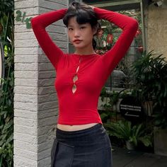 Elegant Hollow Slim Long Sleeve Bow Sexy Cropped Top Y2K Spring Clothing Size Chart SIZE/CM BUST SHOULDER SLEEVE LENGTH S 76-86 37 60 45 M 80-90 38 61 46 L 84-94 39 62 47 NOTE: 1.Please follow the size chart to select the size.Don't select directly according to your habits. 2.This data was obtained from manually measuring the product, it may be off by1-3CM. 3.Colour may vary due to lighting on images.The real pictures are closest to the true colour of the product. Y2k Red Top For Club, Red Long Sleeve Y2k Top, Red Y2k Style Tops For Party, Red Y2k Long Sleeve Tops, Red Club Top For Fall, Red Top For Club In Fall, Red Casual Tops For Club, Y2k Spring, Winter Outfits Christmas