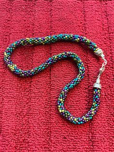 Athabaskan crochet rope necklace, a must have for any occasion, great gift, a great way to celebrate Alaska Native history. Adjustable Crochet Beaded Necklace For Gift, Multicolor Crochet Necklaces, Crochet Beaded Necklaces With Round Beads For Gift, Handmade Multicolor Lariat Beads, Adjustable Crochet Necklaces With Round Beads, Native History, Beaded Rope Necklace, Crochet Rope, Beaded Rope