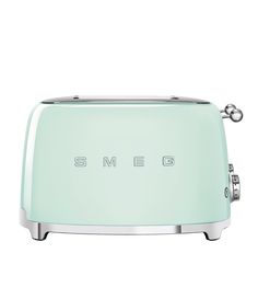 the smeg toaster is mint green and silver