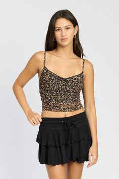 Unleash your wild side with the EMORY PARK Dark Leopard Print V Neckline Ruched Crop Top. This fierce top features a trendy leopard print and a flattering V neckline that will showcase your feminine style. The ruched detailing adds a touch of chicness while the cropped length gives you the perfect opportunity to show off your curves. Take your fashion game to the next level with this must-have piece! SIZE & FIT :MODEL WEARS SIZE SMALLMODEL'S HEIGHT 5'9 Made In: USA Leopard Print V-neck Tops For Night Out, Casual Leopard Print Tops For Night Out, Trendy Leopard Print V-neck Top, Trendy Leopard Print Tops For Night Out, Leopard Print Tops For Night Out In Spring, Chic Leopard Print Tops For Night Out, Leopard Print Tops For Spring Night Out, Stretch Tiger Print Top For Summer, Sleeveless Leopard Print Top For Night Out