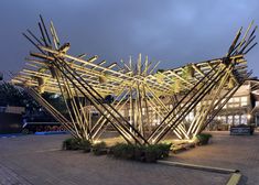 a building made out of sticks and lights