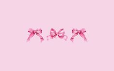 three pink bows on a pink background