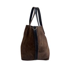 Soft, thick Argentinian small suede leather tote bag with short strap that sits under the arm. This tote style leather bag features an interior removable pouch which sections the bag, and a pocket. Contrasting leather strap detail. This tote is available in 3 colors. - Measures 8”H X 13 1/2”W X 7” D- 5” Handle Drop Inside pouch- 7 1/2”H X 12” X 5”D - 45” extra long strap . Modern Rectangular Suede Hobo Bag, Chic Suede Bucket Bag With Removable Pouch, Chic Suede Bag For On-the-go, Modern Suede Hobo Bag With Double Handle, Modern Shoulder Bag With Suede Lining, Modern Double Handle Suede Hobo Bag, Modern Suede Shoulder Bag With Removable Pouch, Chic Rectangular Suede Bucket Bag, Modern Suede Satchel Shoulder Bag