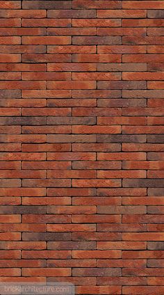 a red brick wall that is very close to the ground