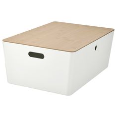 a white storage box with a wooden lid and black trim on the bottom, against a white background