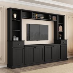 an entertainment center with black cabinets and a flat screen tv on the wall, in a living room