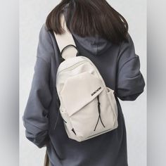 Brand New! Casual, Simple Sling Bag, Backpack For Men And Women. Two Side Pockets, And Has Reflective Strip. Length: 8.5 Inch Height: 12.5 Inch Width: 4.5 Inch Casual Crossbody Backpack With Anti-theft Pocket, Casual Chest Bag With Anti-theft Pocket For School, Beige Backpack Chest Bag For School, Beige Chest Bag Backpack For School, Beige Chest Backpack For School, Casual Shoulder Bag With Anti-theft Pocket For School, Casual Chest Bag With Anti-theft Pocket For Daily Use, Casual School Shoulder Bag With Anti-theft Pocket, Casual Chest Bag With Anti-theft Pocket