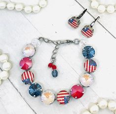 Patriotic Red White and Blue Austrian Crystal Bracelet, Patriotic Flag Crystal Bracelet, Patriotic Flag Statement Necklace, YOU CHOOSE METAL The sparkling patriotic Crystal Elements of denim blues, bright reds, and crystal beige make up the perfect Necklace, Bracelet and Earrings to wear any time of the year. The faceted crystals are brilliant and very rich while showing the red, beige, and blues of the Independence Flag. These jewelry pieces are sure to match many of your outfits. The necklace Patriotic Flag, Czech Crystal, Crystal Charm, Faceted Crystal, Crystal Bracelet, Matching Necklaces, Austrian Crystal, Red White And Blue, Necklace Bracelet