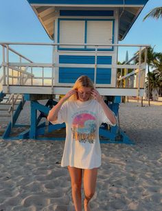 Catch the vibe with our Pink Sunset Beach Bum T-shirt! This relaxed-fit tee features: - Soft, high-quality material for ultimate comfort- Vibrant pink sunset design for a beachy vibe- 'Beach Bum' text for a laid-back, carefree attitude- Perfect for beach trips, summer adventures, or everyday wear Embrace your inner beach bum with our Pink Sunset Beach Bum T-shirt. Order now and soak up the sun in style! Summer Fits Oversized Tees, Beachy Fits, Happy Hoodie, Oversized Tees, Summer Stuff, Vintage Tank Top, Beach Pics, Coffee Sweatshirt, Coconut Girl