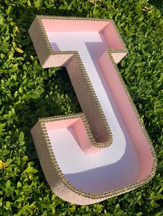 the letter e is made out of cardboard