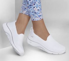 Experience ultimate comfort and support wearing Skechers GO WALK Arch Fit 2.0 - Saida. This laceless design features an engineered mesh upper with a removable Arch Fit insole, lightweight ULTRA GO cushioning, plus Comfort Pillar Technology for added support. | Skechers Women's GO WALK Arch Fit 2.0 - Saida Slip-On Shoes | Medium Width | Patented Skechers Arch Fit insole system with podiatrist-certified arch support | Podiatrist-designed shape developed with 20 years of data and 120, 000 unweighte Skechers Shoes Women, Uniform Accessories, Skechers Go Walk, Tenis Nike, Lace Up Wedges, Wide Shoes, Itchy Skin, Skechers Women, 4 Inch Heels