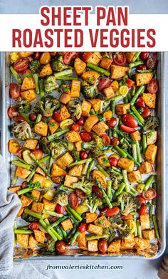 sheet pan roasted veggies with tomatoes, broccoli and tofu in it