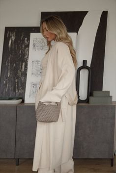 mini handbag paired with a cream cardigan Taupe Bag Outfit, Winter Midsize Outfits, Midsize Outfits Winter, Taupe Handbag, Taupe Bag, Night Outfits Winter, Cream Outfit, Casual Date Night Outfit, Midsize Outfits