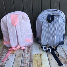 Backpack - Toddler sized backpack with a choice of styles. There is one zipper pocket in the front as well as small pockets on either side of the backpack. Seersucker Dimensions are: 12" long x 9.5" wide x 3.5" deep Gingham and Flower Pattern Dimensions are: 13" long x 10" wide x 3.5" deep Seersucker only Matching Lunch Box Tote available Here: https://littleblanks.com/collections/baby-accessories/products/seersucker-lunch-tote-box Looking for the Matching Duffel Backpack they are available only Matching Backpacks, Kindergarten Backpack, Backpack Outfit, Duffel Bag Backpack, Busy Bags, Pink Gingham, Pink Backpack, Girls Rompers, Overnight Bag