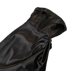 the back of a woman's black dress on a white background