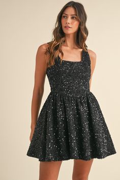 Indulge in the glamour of our Sparkle and Shine Sequin Dress. This sleeveless tweed dress boasts a flattering fit and flare silhouette, adorned with shimmering sequins. The back exposed zipper adds a touch of edginess, while the lining ensures comfort. Elevate your style with this exclusive and luxurious piece in classic black. Basque Waist, Sequence Dress, Chanel Tweed, Jumpsuit Skirt, Sparkle And Shine, Tweed Dress, Hair Fragrance, Shoe Gifts, Exposed Zipper