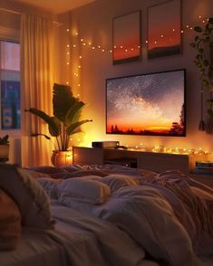 a bedroom with lights on the wall and a bed in front of a flat screen tv