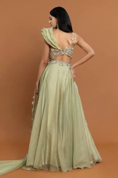 Green flared lehenga with placed thread embroidered floral applique motifs. Comes with a padded floral applique blouse, highlighted by sequin work and choker dupatta. - Aza Fashions Sleeveless Party Wear Lehenga For Reception, Designer Sleeveless Anarkali Party Set, Side Open Lehenga With Unstitched Blouse For Reception, Bollywood Style Side Open Wedding Lehenga, Pista Green Saree Dress For Party, Wedding Dress With Zari Work And Side Open Design, Side Open Wedding Dress With Zari Work, Sleeveless Gown With Sheer Dupatta For Reception, Sleeveless Party Dress With Dupatta