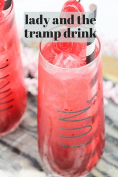 lady and the tramp drink with cherry garnish in glasses on a table