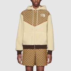 The North Face x GUCCI GG Canvas Shearling Jacket 'Beige' 644582-XJC3T-2102 Luxury Cream Gucci Outerwear, Luxury Gucci Cream Outerwear, Gucci Long Sleeve Cream Outerwear, Gucci Cream Winter Outerwear, Gucci Cream Long Sleeve Outerwear, Luxury Hooded Gucci Outerwear, Luxury Gucci Hooded Outerwear, Beige Gucci Outerwear For Winter, Designer Gucci Hooded Outerwear