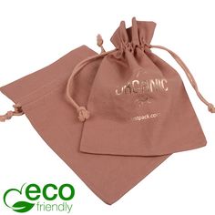 a pink bag with the word organic on it sitting next to an eco friendly pouch